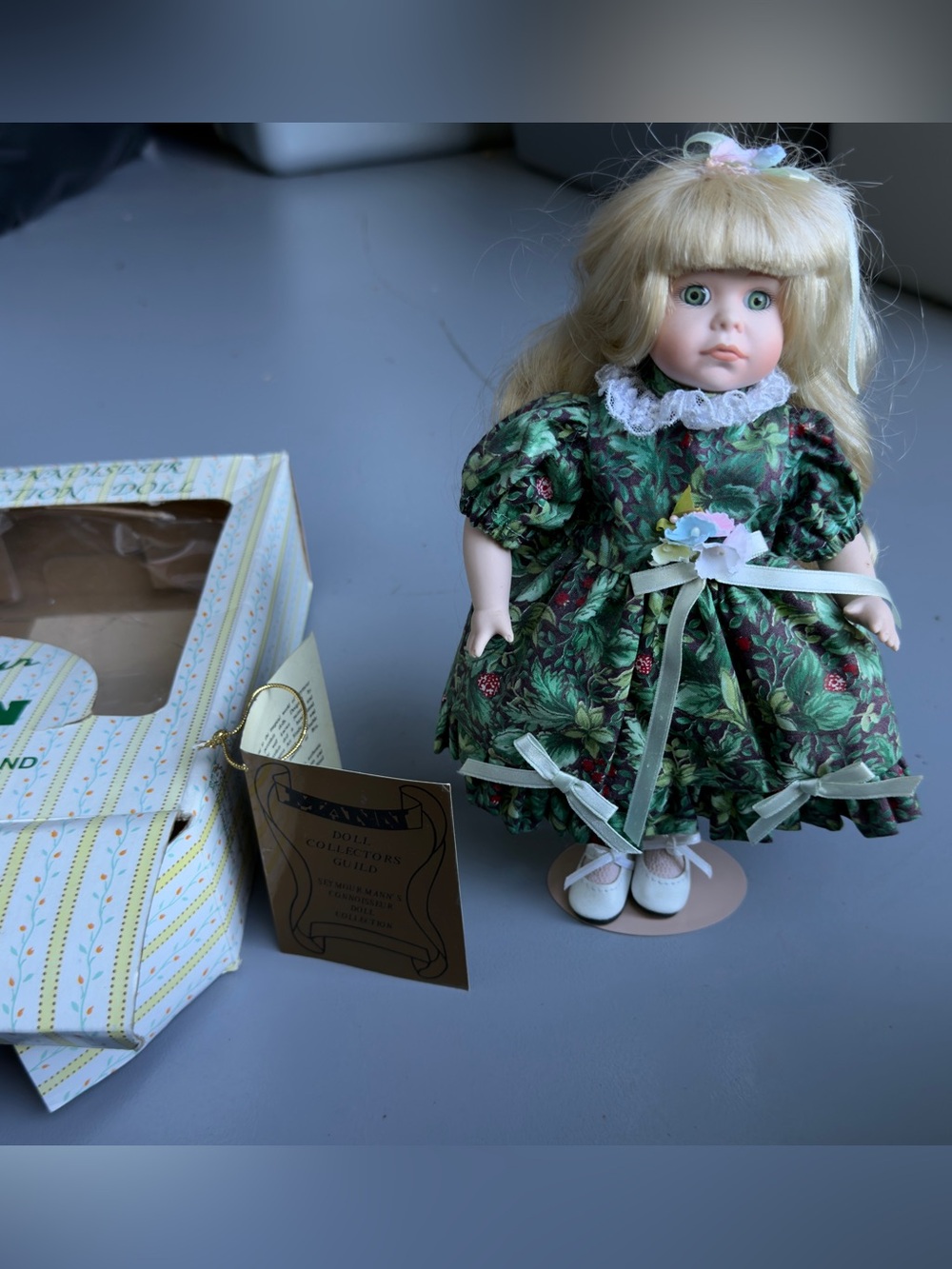 Porcelain Doll in Green Floral Dress - Collector Toy